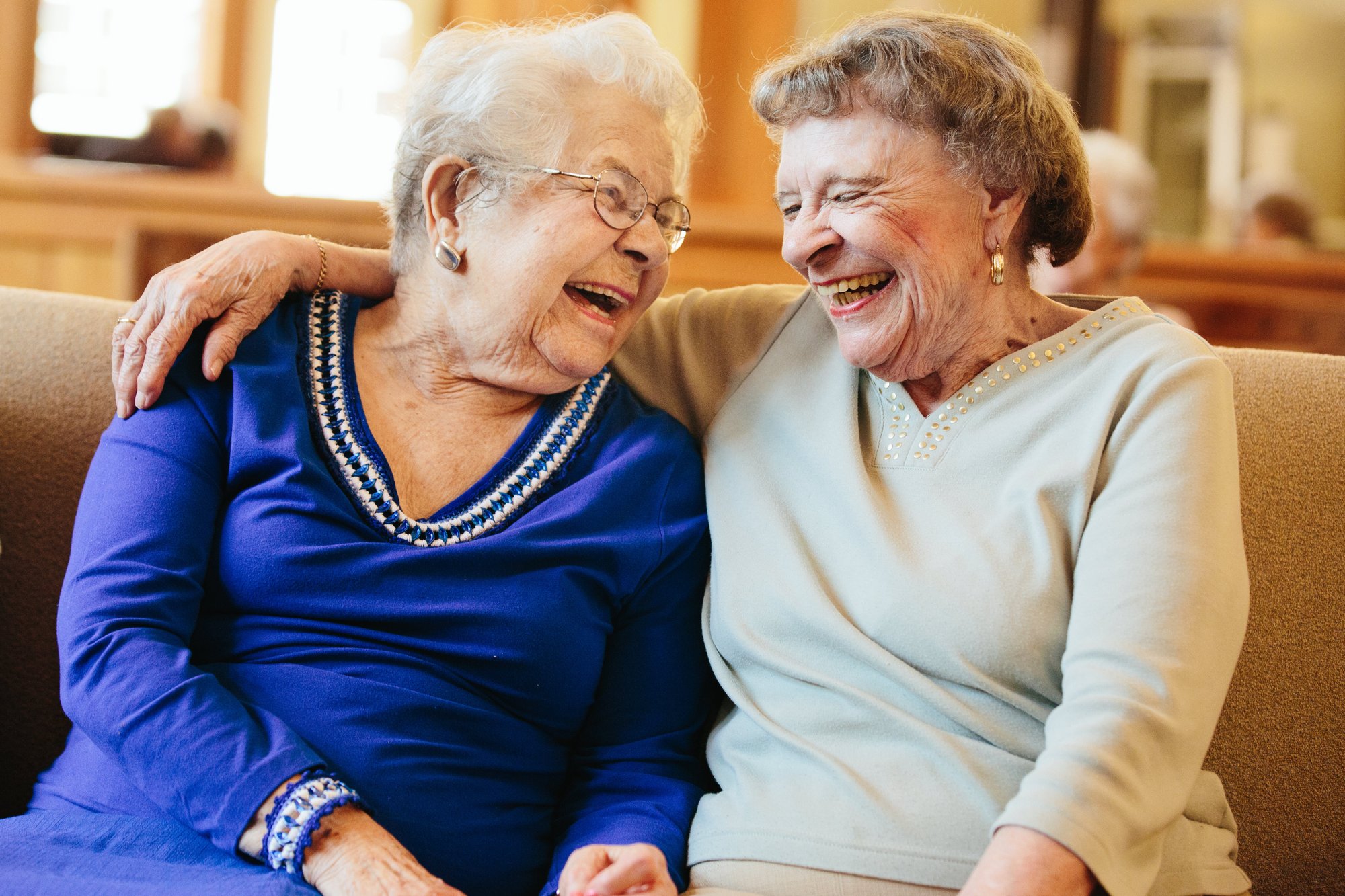 Two residents laughing