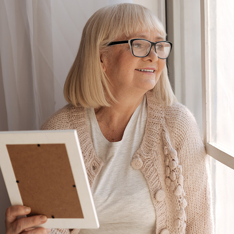 Delighted cheerful woman smiling