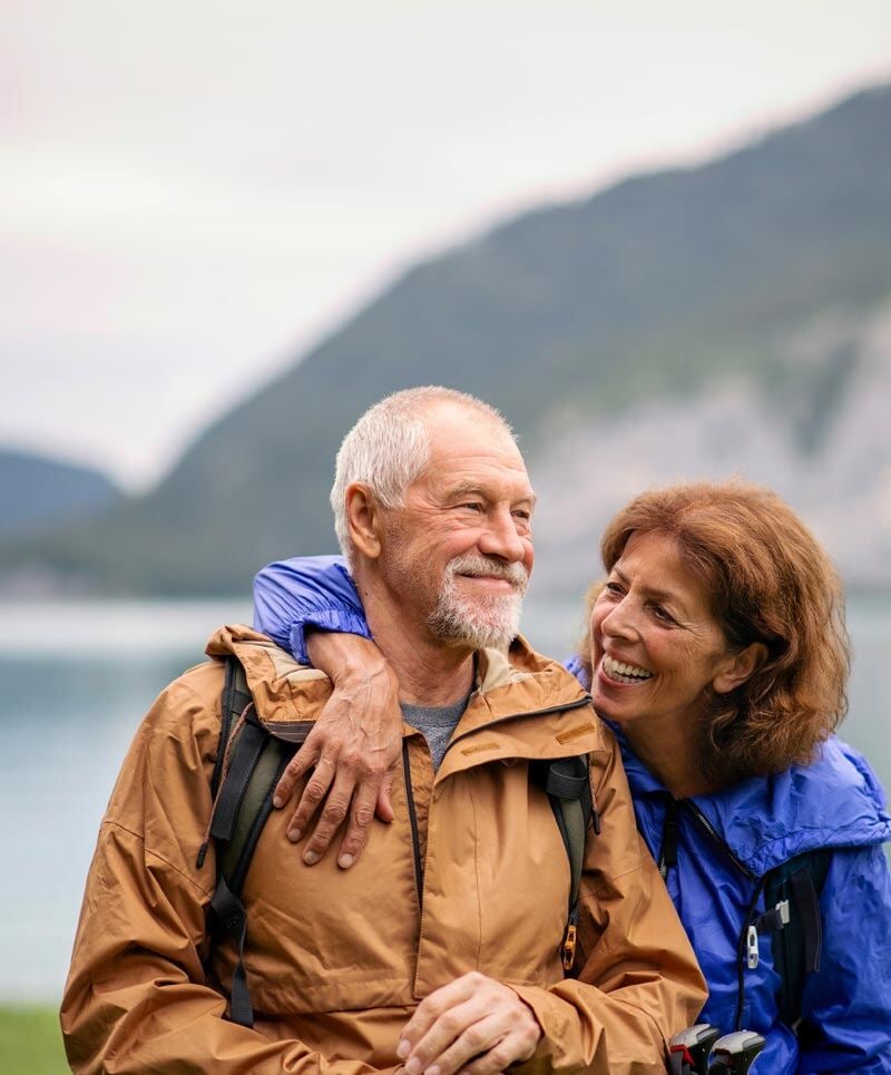 elderly couple hiking in the pacific northwest