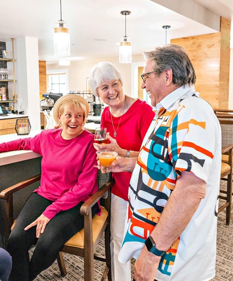 group of senior residents enjoying drinks